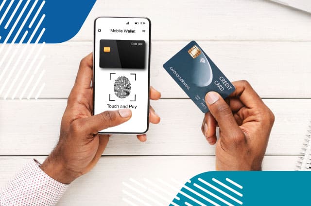 Person using mobile wallet while holding a credit card